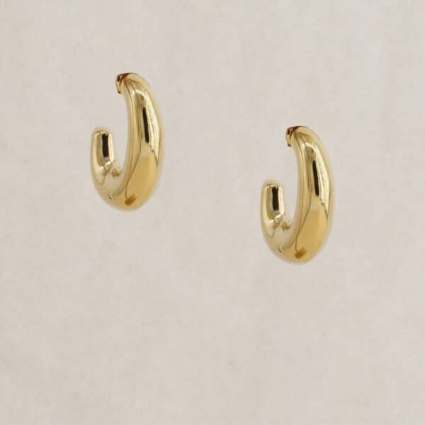 Boucles d'oreilles dorées en forme de 3/4 ovale, créées par Jorgina chez Dolita-bijoux