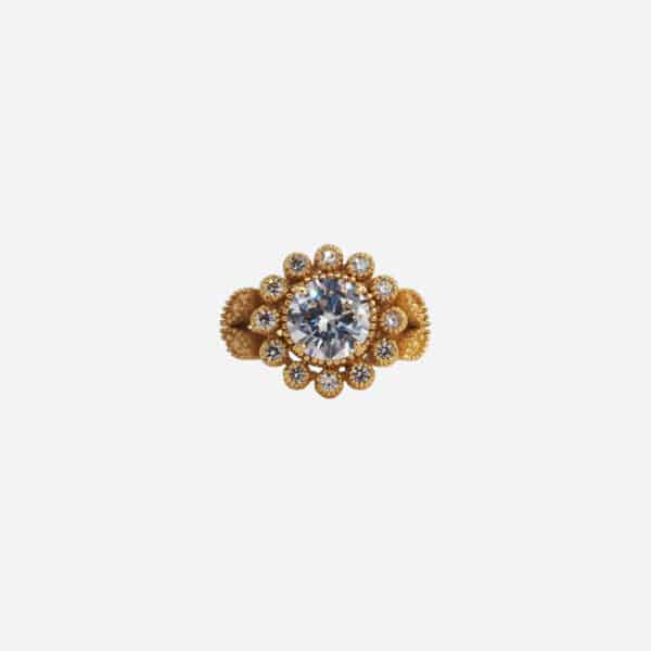 Bague Emy de Virginie Berman en laiton plaqué or sertie d’un zircon blanc style vintage