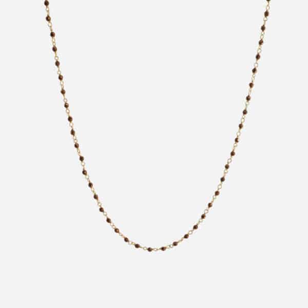 Collier Inde Hématite Cuivrée de Une à Une avec pierres facettées cuivrées et chaîne dorée